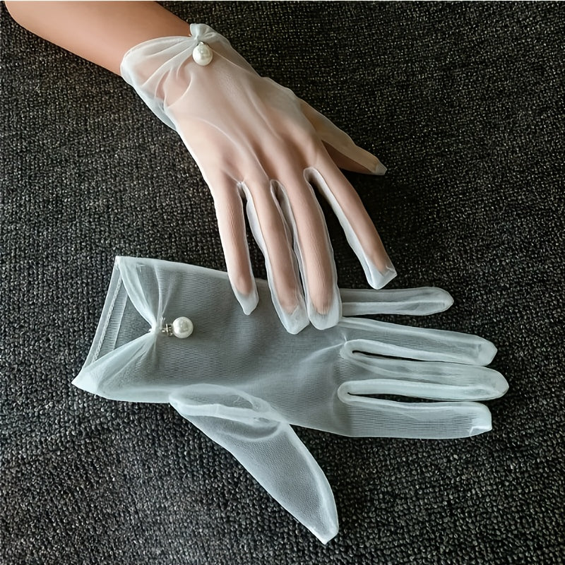 Wedding gloves made of fine tulle decorated with pearl