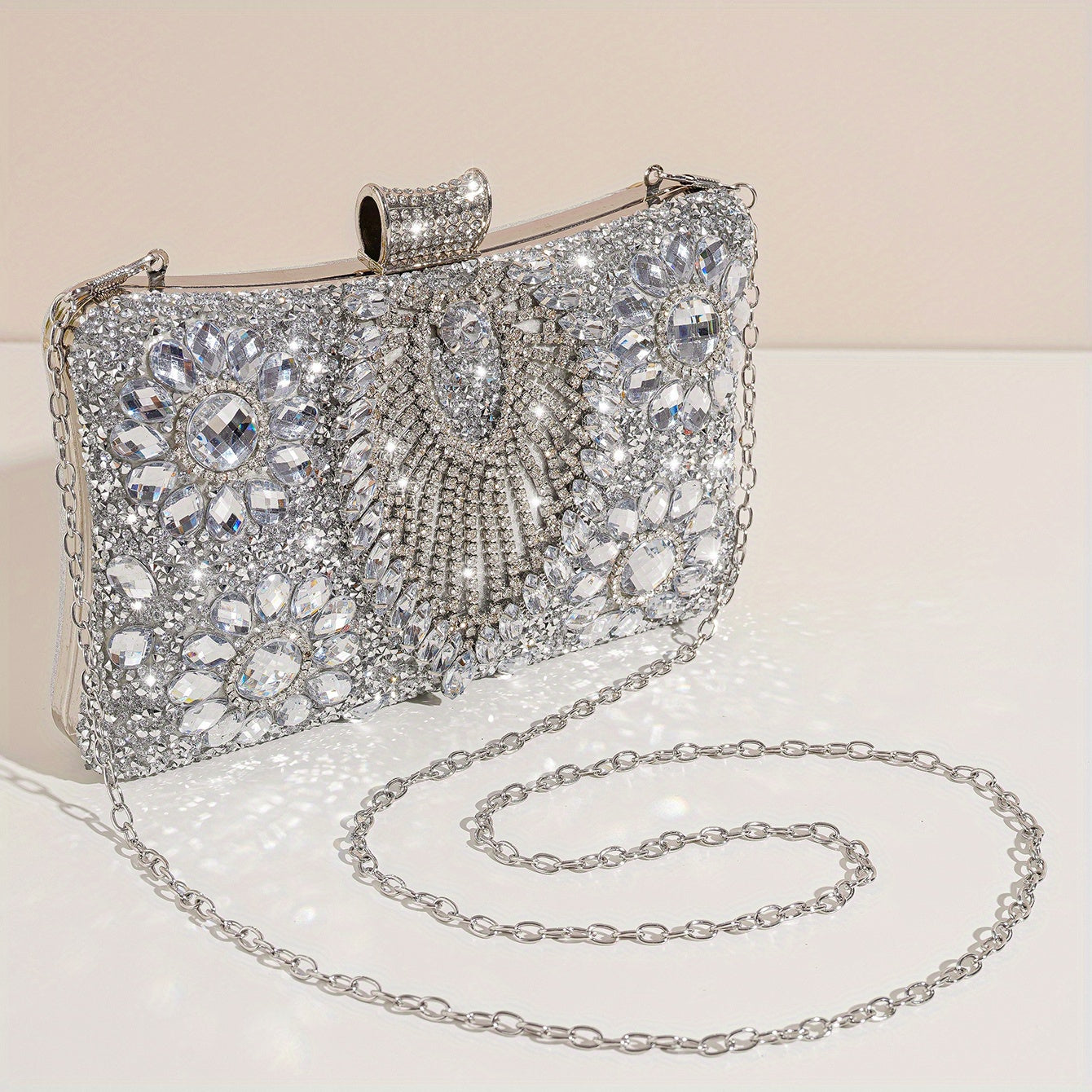 Shiny silver clutch with rhinestones