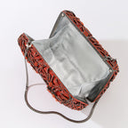 Evening clutch with glass stones and floral pattern