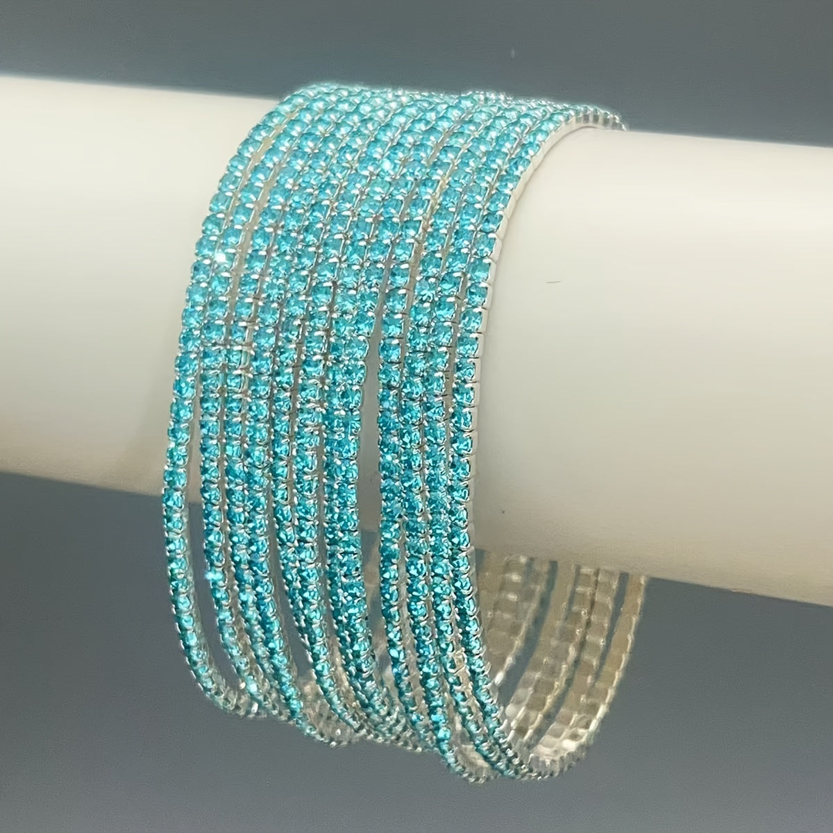 Set of 12 glittering bracelets with rhinestones