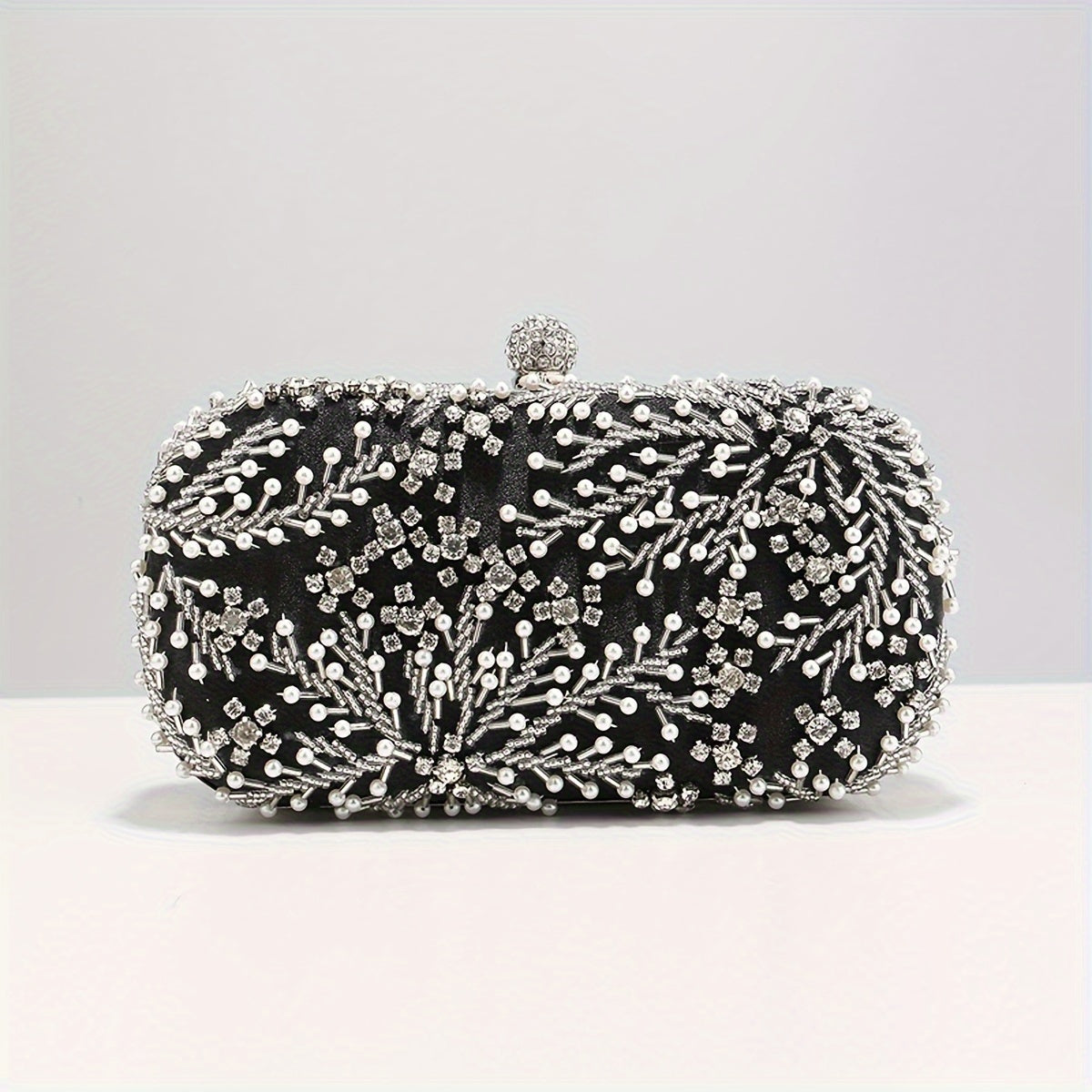 Luxurious clutch bag with rhinestone decoration