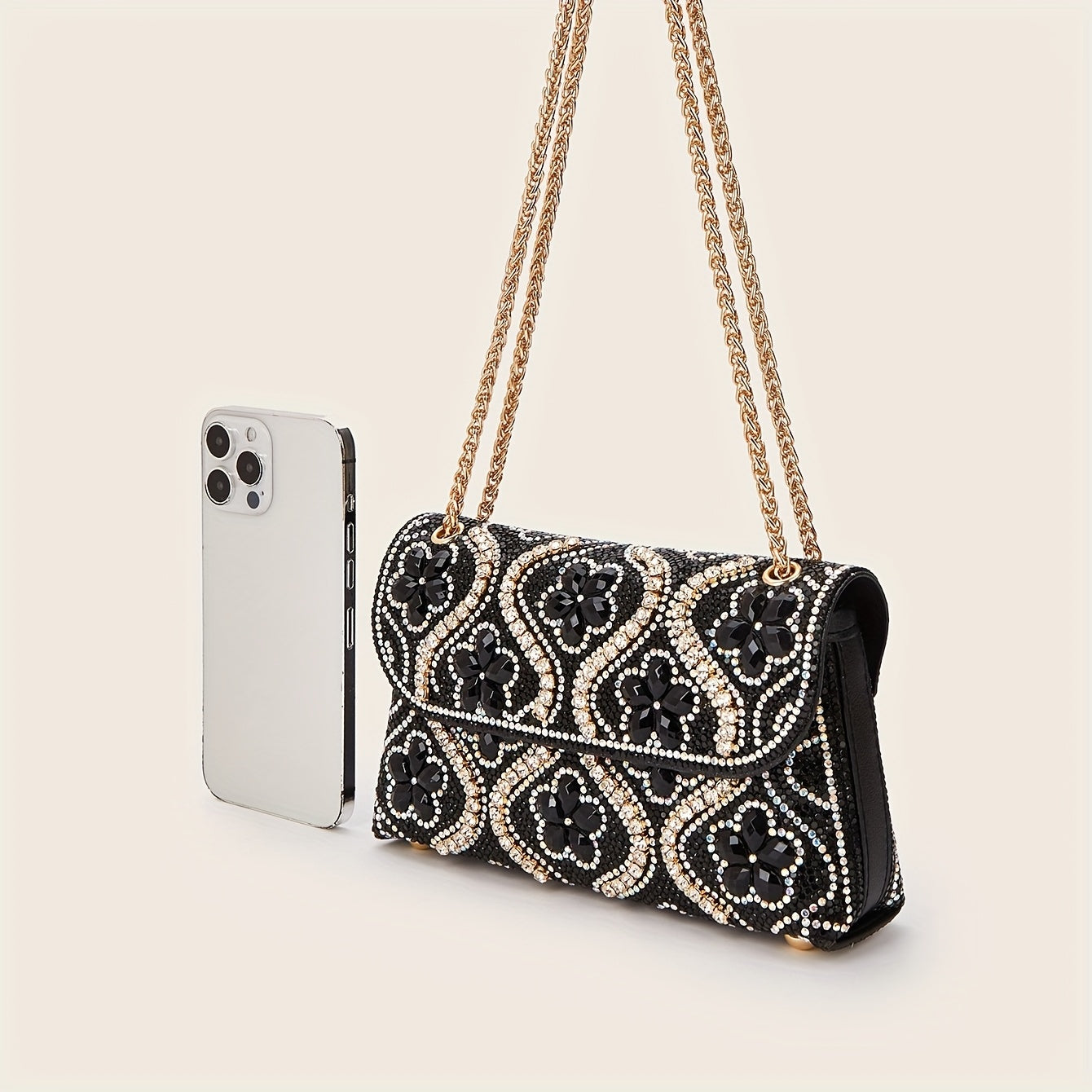 Elegant clutch with a pattern and glittering rhinestones