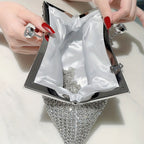 Glittery evening clutch decorated with rhinestones