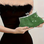 Glittery evening clutch decorated with rhinestones