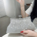 Glittery evening clutch decorated with rhinestones