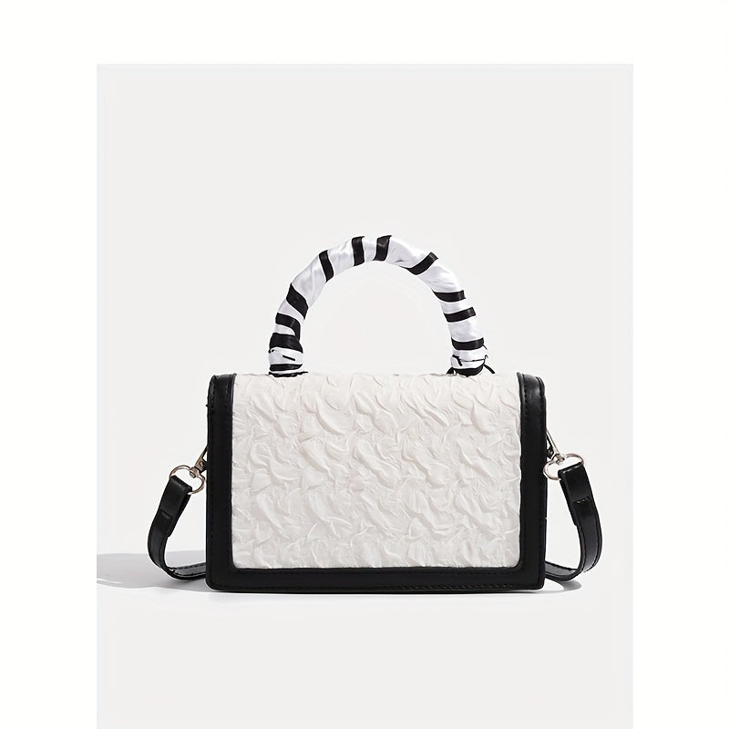 Stylish black and white handbag