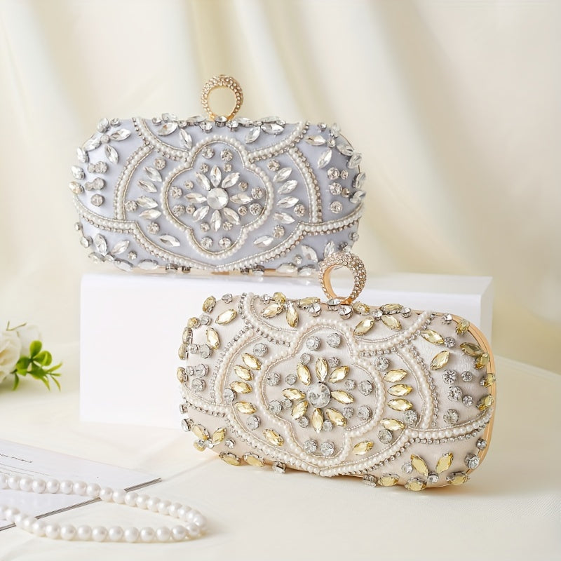 Stylish evening clutch decorated with luxurious beads and glittering rhinestones