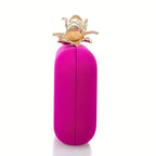 Metallic lycra clutch with lotus-shaped clasp