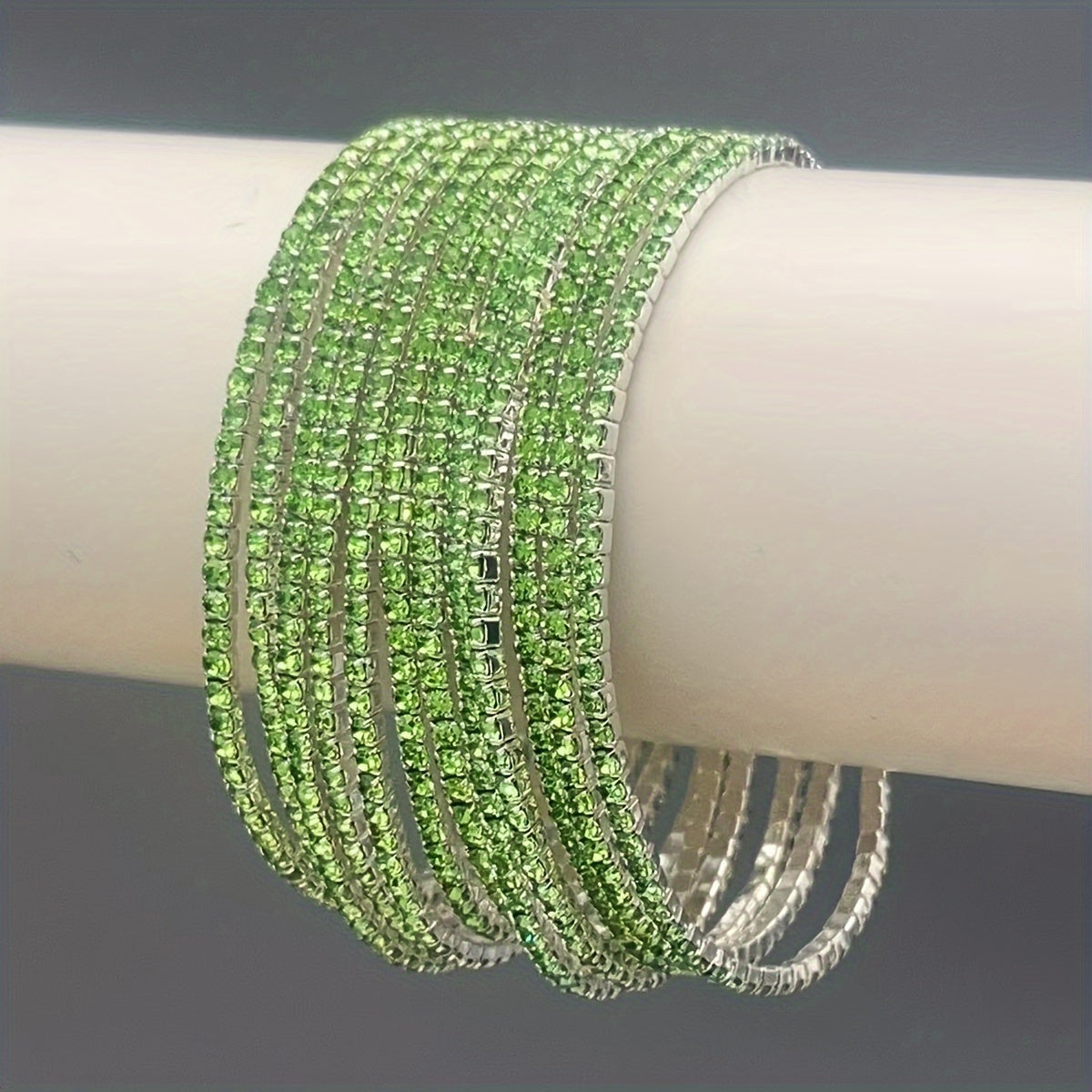 Set of 12 glittering bracelets with rhinestones