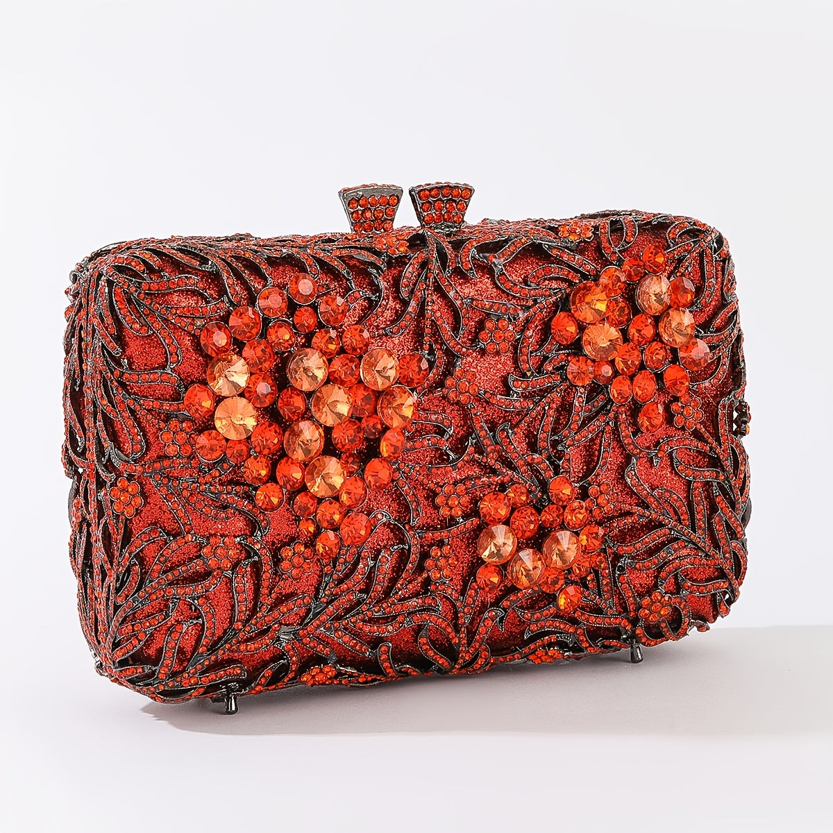 Evening clutch with glass stones and floral pattern