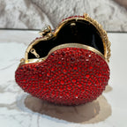 Mini heart-shaped handbag decorated with rhinestones
