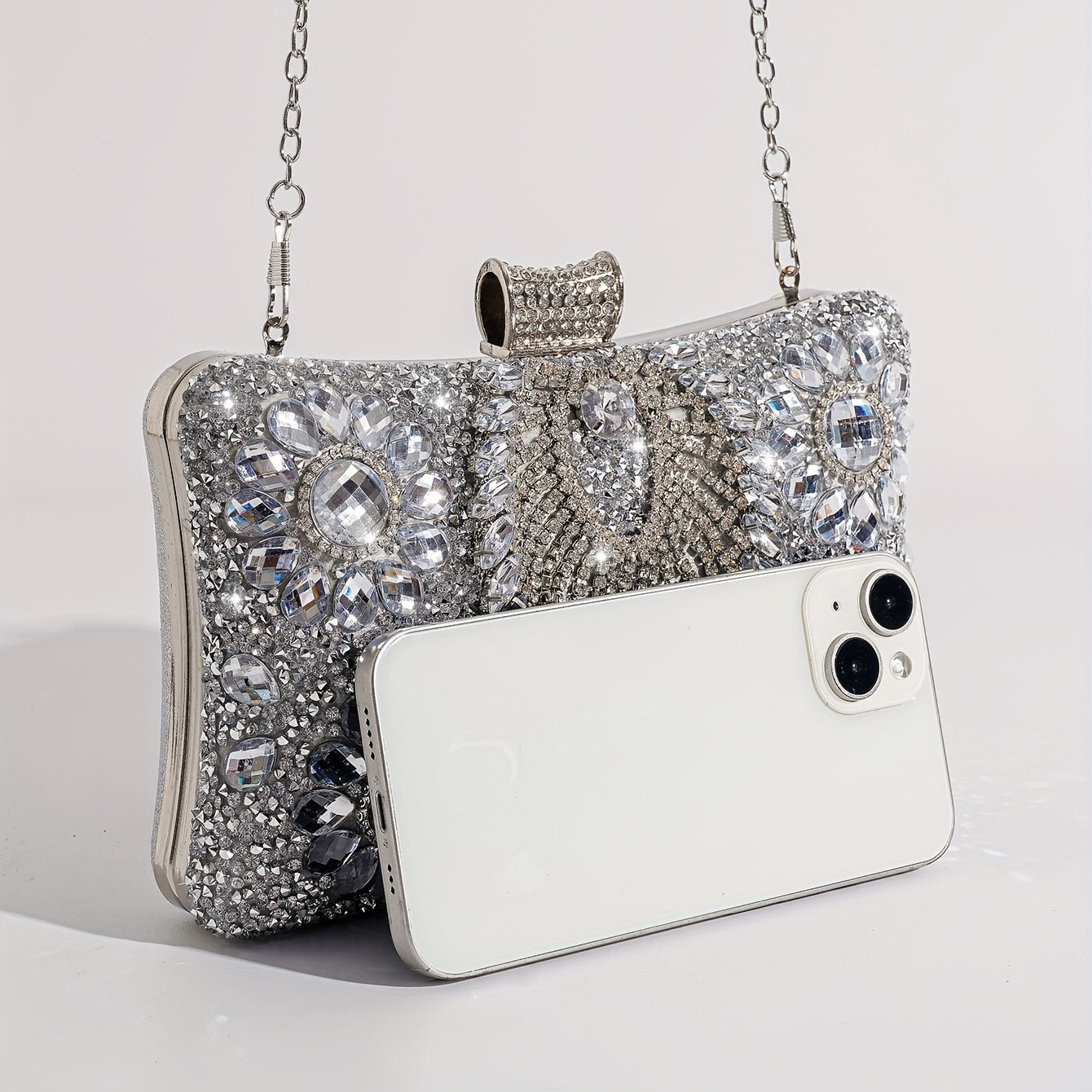 Shiny silver clutch with rhinestones
