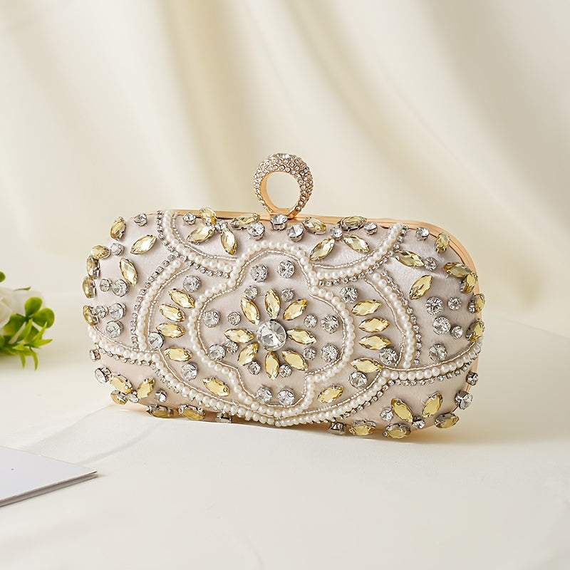 Stylish evening clutch decorated with luxurious beads and glittering rhinestones