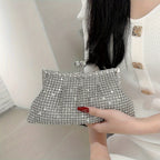 Glittery evening clutch decorated with rhinestones