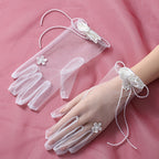 Wedding gloves with floral decoration