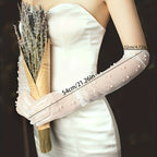 Transparent wedding gloves with hand-set pearls