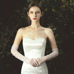 Transparent wedding gloves with hand-set pearls