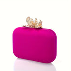Metallic lycra clutch with lotus-shaped clasp