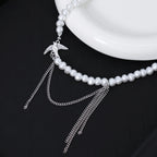 Asymetrický náhrdelník s holubičkou
