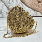 Mini heart-shaped handbag decorated with rhinestones