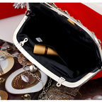Elegant handbag for weddings and parties decorated with rhinestones with a removable strap
