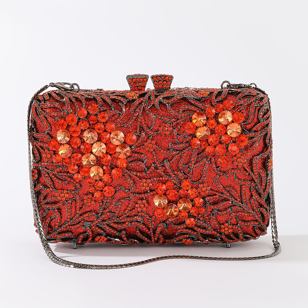 Evening clutch with glass stones and floral pattern