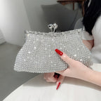 Glittery evening clutch decorated with rhinestones