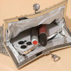 Glittery evening clutch decorated with rhinestones