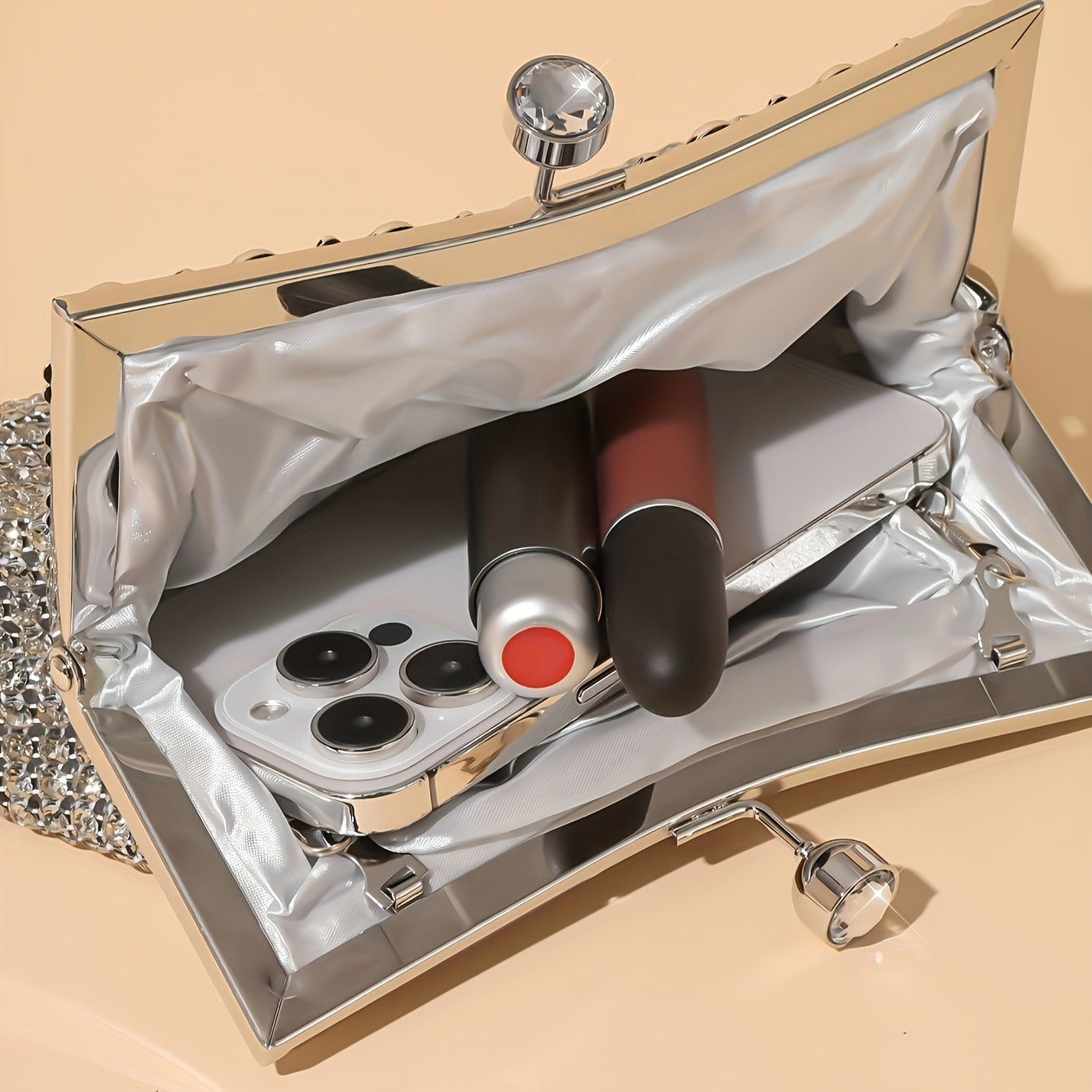 Glittery evening clutch decorated with rhinestones
