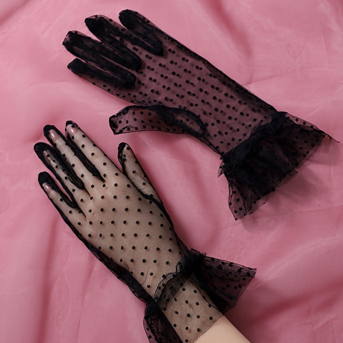 Pleated black gloves with a dotted pattern