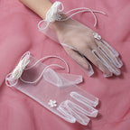 Wedding gloves with floral decoration