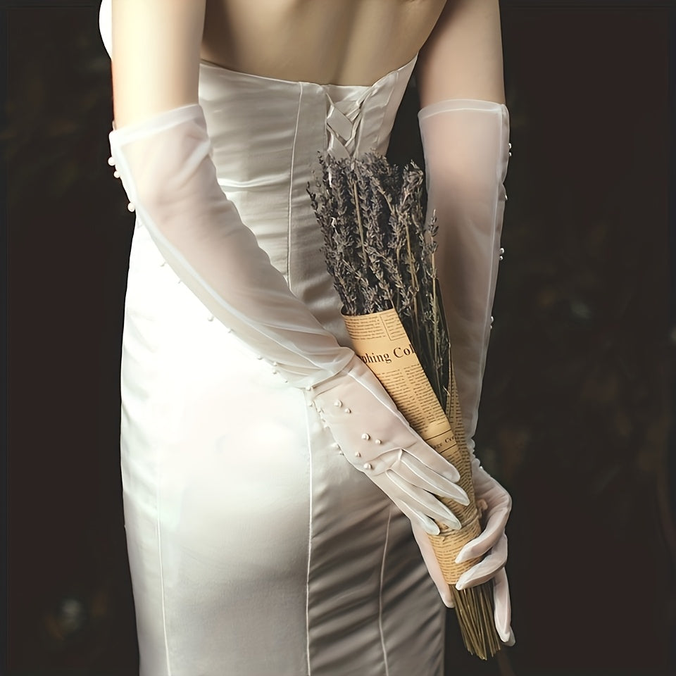Transparent wedding gloves with hand-set pearls