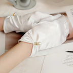 Elegant satin gloves decorated with pearls