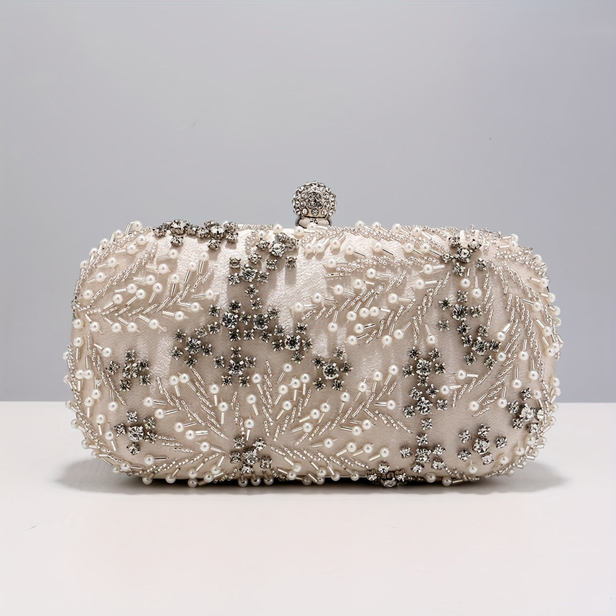 Luxurious clutch bag with rhinestone decoration