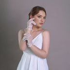 Short wedding gloves made of transparent tulle