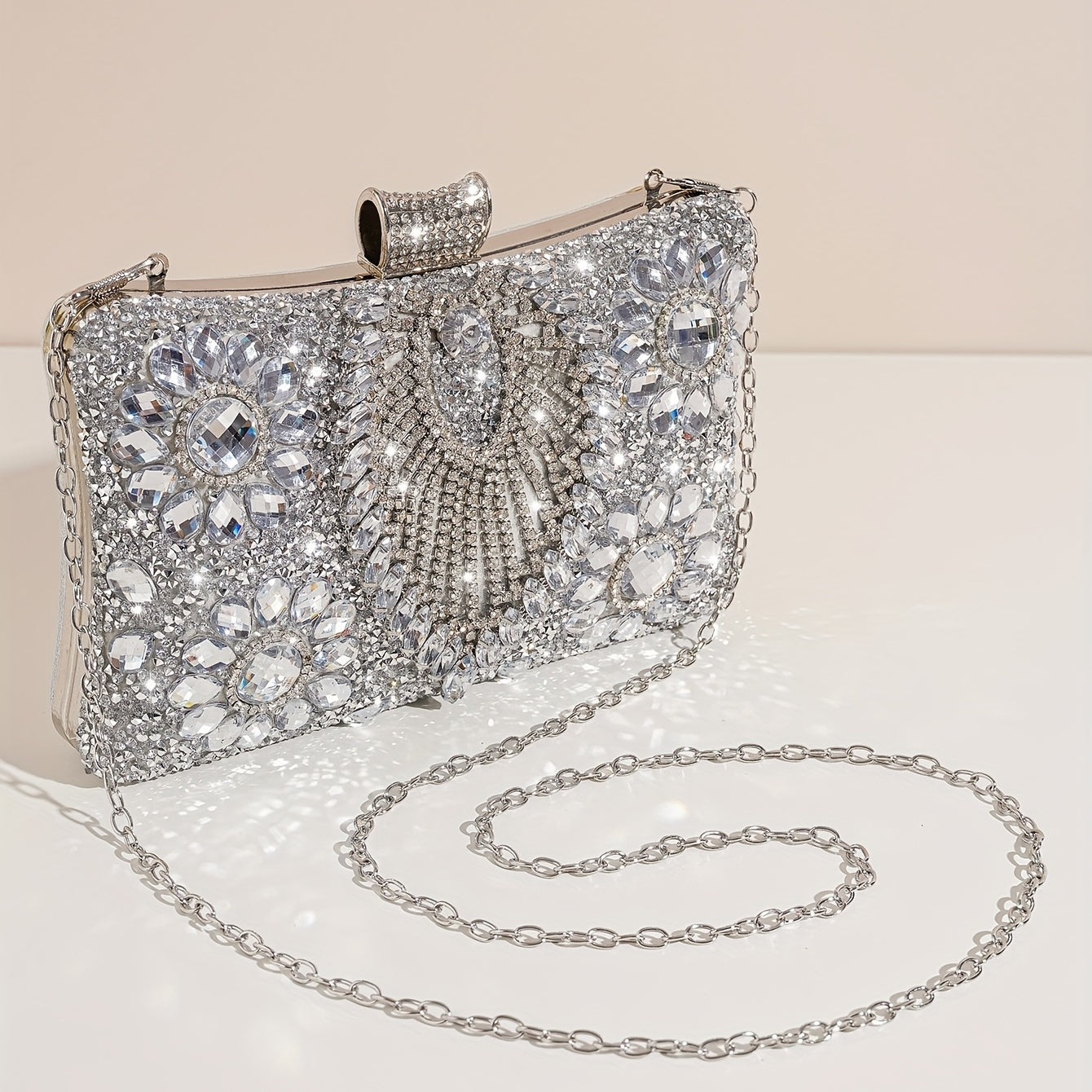 Shiny silver clutch with rhinestones