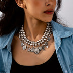 Necklace with pendants in the shape of a rose, pentagram, oval, heart and cross