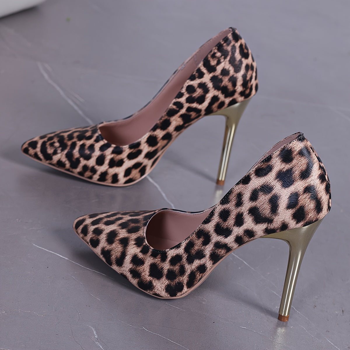 Leopard print high heel pumps