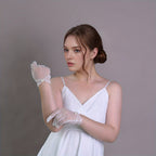 Short wedding gloves made of transparent tulle