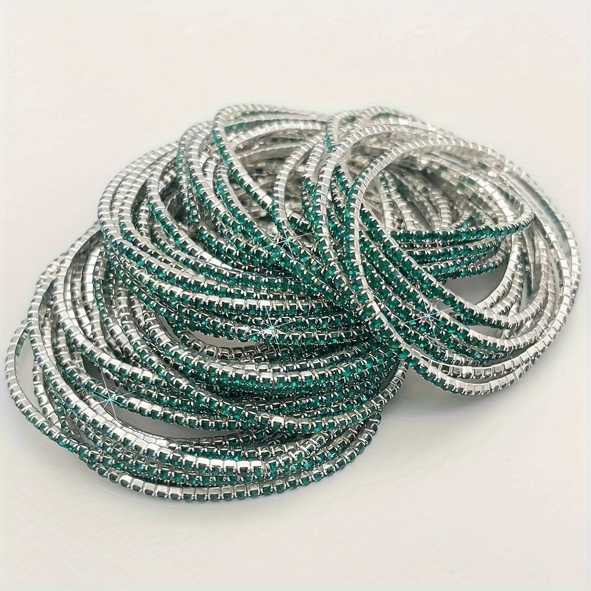 Set of 12 glittering bracelets with rhinestones