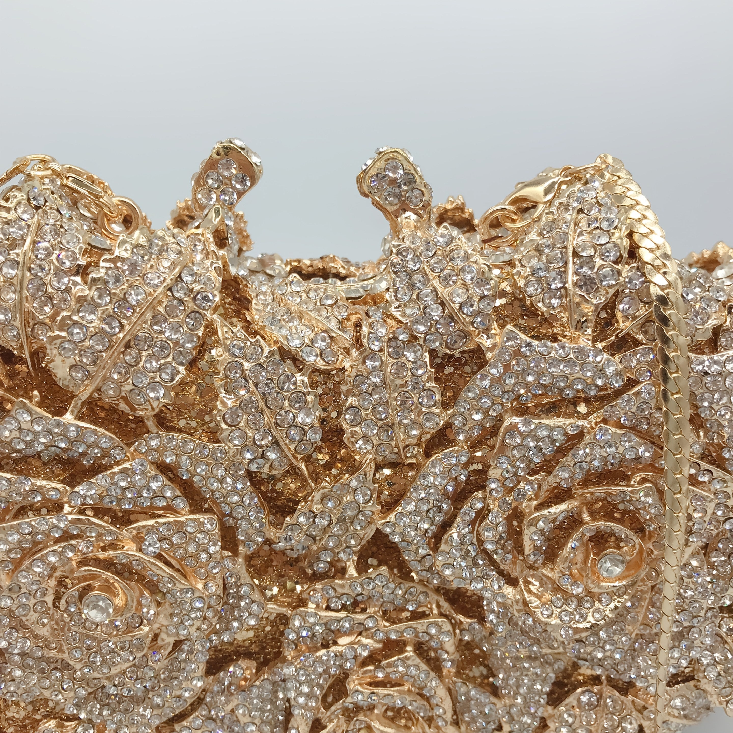Luxurious glittering handbag with rose motif