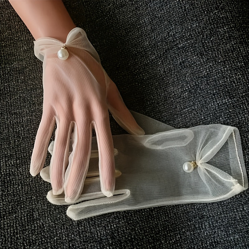 Wedding gloves made of fine tulle decorated with pearl