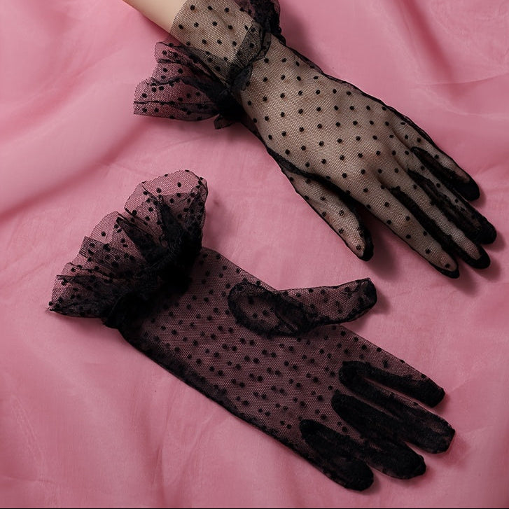 Pleated black gloves with a dotted pattern
