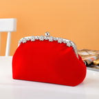 Elegant handbag for weddings and parties decorated with rhinestones with a removable strap